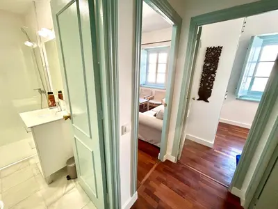 a hallway with a door open to a room at El Palacito 