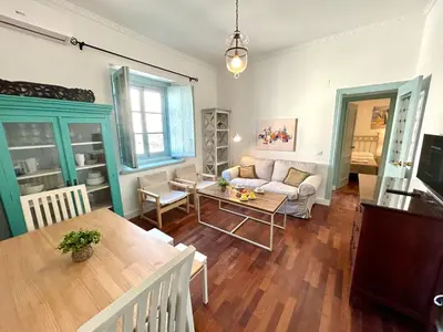 a living room with a couch and a table at El Palacito 