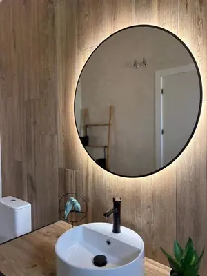 a bathroom with a white sink and a mirror at GUACA 2 in Cádiz