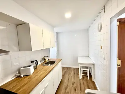 a kitchen with a sink and a counter top at Brisa marina free parking by Staycare in Rota