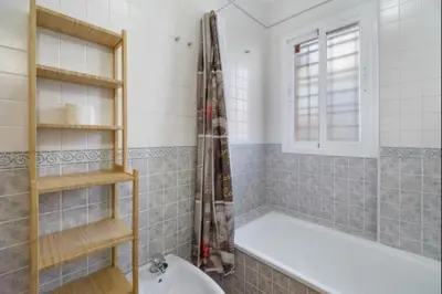 a bathroom with a shower and a bath tub at Esperanza free parking by Staycare in Rota