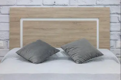a bed with two pillows on top of it at Paraíso Candor free parking by Staycare in Rota