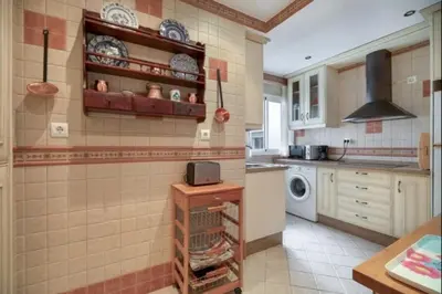a kitchen with a sink and a stove in it at Pinar del Mar by Staycare in Rota