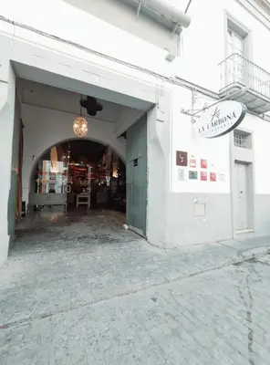 an entrance to a building with a door open at Amber Suite in Jerez de la Frontera