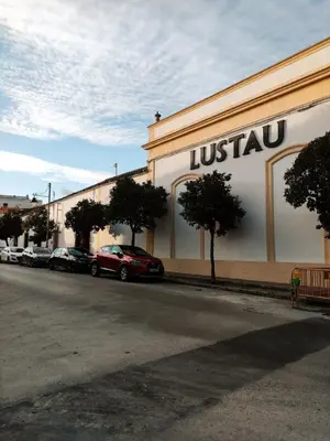 a building with a sign on the side of a street at Amber Suite in Jerez de la Frontera