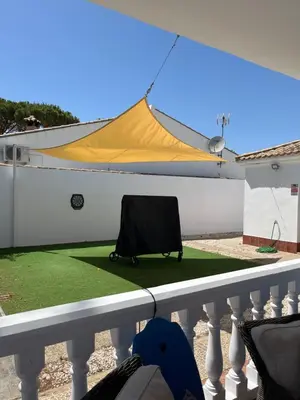 a tent on the balcony of a house at Rincón del mar in Novo Sancti Petri