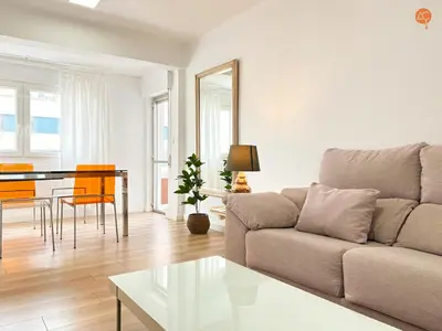 a living room with a couch and a table at Mar de Viya Grupo AC Gestion in Cádiz