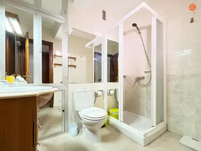 a bathroom with a shower and a toilet and a sink at Mar de Viya Grupo AC Gestion in Cádiz