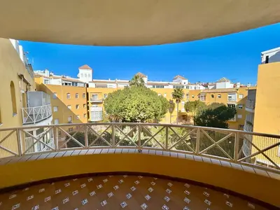 a balcony with a view of buildings at Gatu VILLA ANTILLAS parking gratis preferentemente mayores de 25 años y familias in El Puerto de Santa María