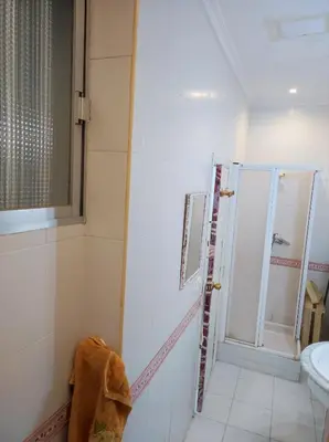 a bathroom with a shower and a sink at Old Merchant's Home in Cádiz