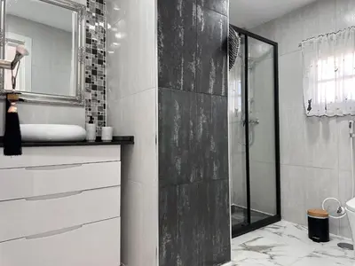 a bathroom with a shower and a sink at Dante Suite - Ole Solutions in Jerez de la Frontera