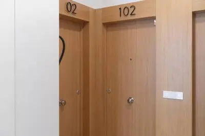 two lockers with numbers on them in a locker room at Apartoyou - El Patio Centro in El Puerto de Santa María