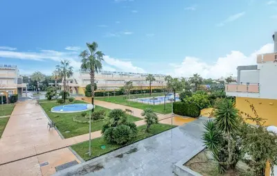 an overhead view of a park with trees and buildings at 4 Bedroom Awesome Apartment In Chipiona in Chipiona