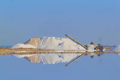 an airplane is flying in front of a mountain at Villa Emilia in Sanlúcar de Barrameda