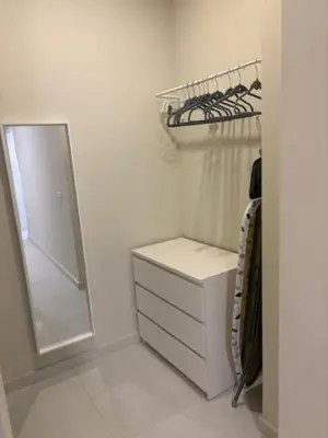 a white closet with a mirror and a drawer at Apartamento la Porvera in Jerez de la Frontera