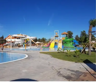 a water park with a water slide and slides at Apartamento en Playa Ballena III in Rota
