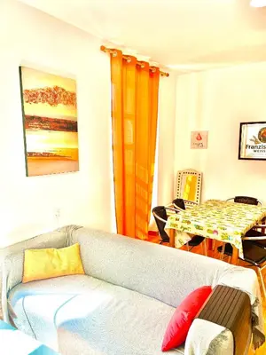 a living room with a couch and a table at Vista Plaza Falla in Cádiz
