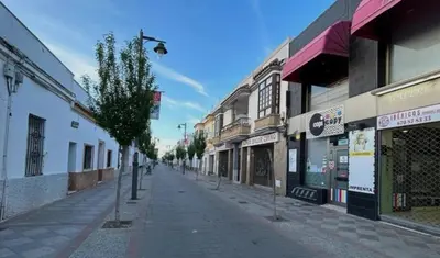 an empty street in a city with buildings at Brisa&Mar, con Posibilidad de Parking in Chipiona