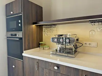 a kitchen with a mixer on a counter at Palacio Jaramago - Ole Solutions in Jerez de la Frontera