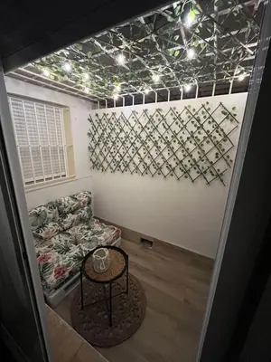 a living room with a couch and a table at Apartamento Sol y Playa in Rota