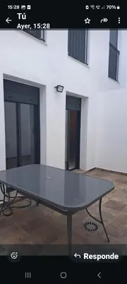 a ping pong table in front of a building at Apartamento la Yedra in Jerez de la Frontera
