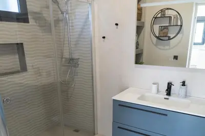 a bathroom with a shower and a sink at Apartamento - Casa Trufa in Conil de la Frontera