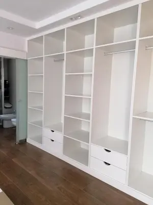 a large white closet with white shelves at Vivienda en Jerez de la Frontera in Jerez de la Frontera
