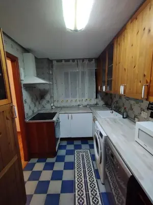 a kitchen with a sink and a dishwasher at Virgen de los Milagros in El Puerto de Santa María