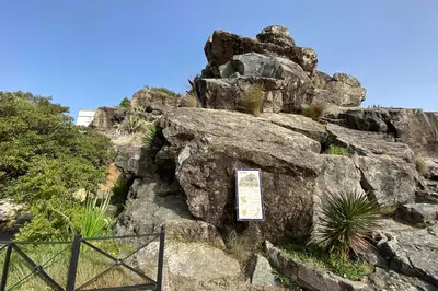 a sign on top of a rock formation at Casa dSanz 