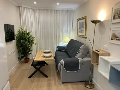 a living room with a couch and a table at Mirador de Sanlucar 3 in Sanlúcar de Barrameda