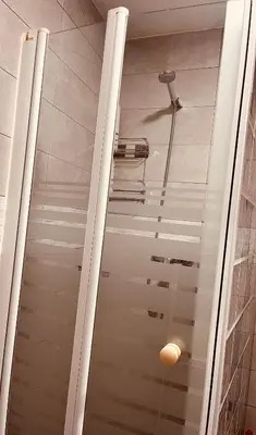 a shower in a bathroom with a ceiling at El Patio de María 2 in Bornos