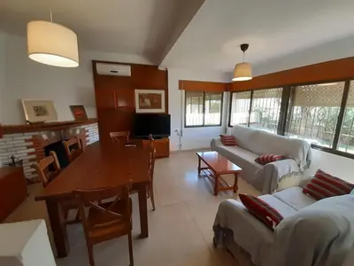 a living room with a couch and a table at Casa Toya in Arcos de la Frontera
