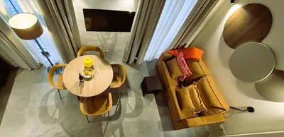 an overhead view of a table and chairs in a room at Apartamentos Robles 4 by Gades Gestión in Cádiz