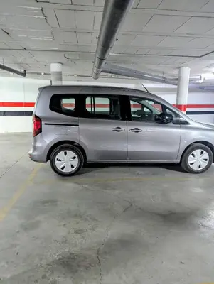 a silver van parked in a parking garage at Apartamento Plaiya De La Red in Sanlúcar de Barrameda