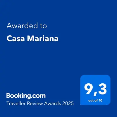 a blue screen with the text awarded to casa mariana at Casa Mariana in Conil de la Frontera