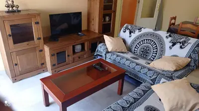 a living room with a couch and a coffee table at Piso a buen precio con 3 HABITACIONES in Puerto Real