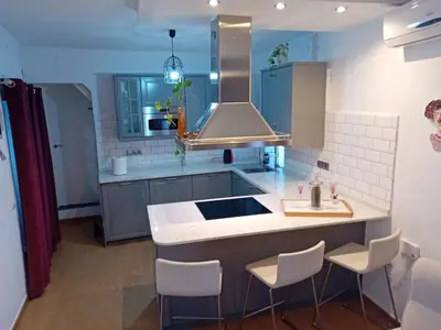 a kitchen with a sink and a counter top at Casa Patricia I in Arcos de la Frontera