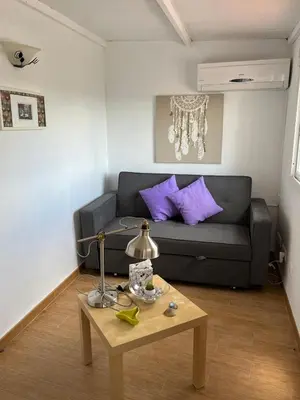 a living room with a couch and a table at Casa Patricia I in Arcos de la Frontera
