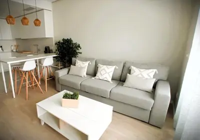 a living room with a couch and a table at Ocean Home - Costa Ballena in Costa Ballena