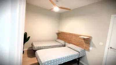 a room with two ottomans in a room at Ocean Home - Costa Ballena in Costa Ballena