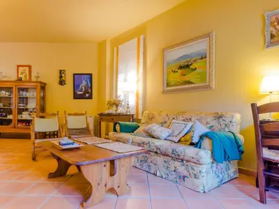 a living room with a couch and a table at Villa La Vega 14354 in Chiclana de la Frontera