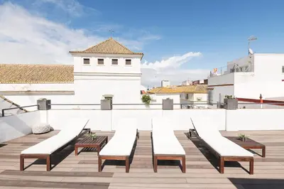 a group of benches on the roof of a building at Mar Abierto A in Sanlúcar de Barrameda