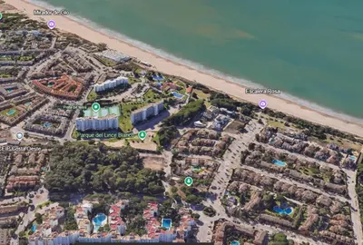 a map of a resort next to a beach at Anc14 Apartamento con 2 habitaciones, patio y piscina al lado de la playa in El Puerto de Santa María