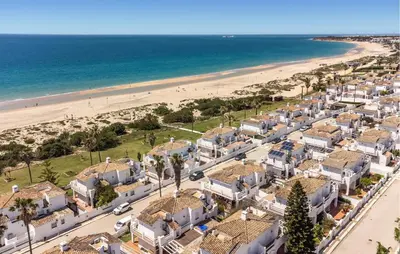 an aerial view of a beach with houses at Stunning Home In Chiclana De La Fronter in Novo Sancti Petri