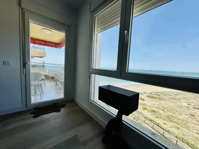a room with a window with a view of the ocean at El Vigia Grupo AC Gestion in Vista Hermosa