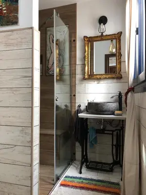 a bathroom with a sink and a mirror at Mediterranean house in Bajo Guía in Sanlúcar de Barrameda