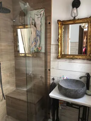 a bathroom with a sink and a mirror at Mediterranean house in Bajo Guía in Sanlúcar de Barrameda