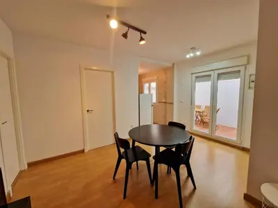 a dining room with a table and chairs at CDZ - San Telmo in Cádiz