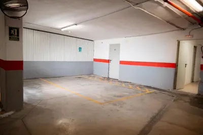 an empty room with a red and white wall at Apartamento Azalea in El Puerto de Santa María