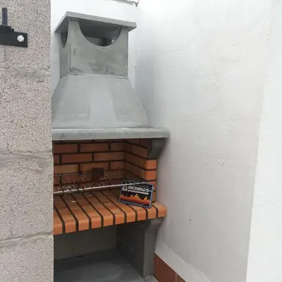 a small brick oven with a book on it at El SITIO DE MI RECREO in El Puerto de Santa María